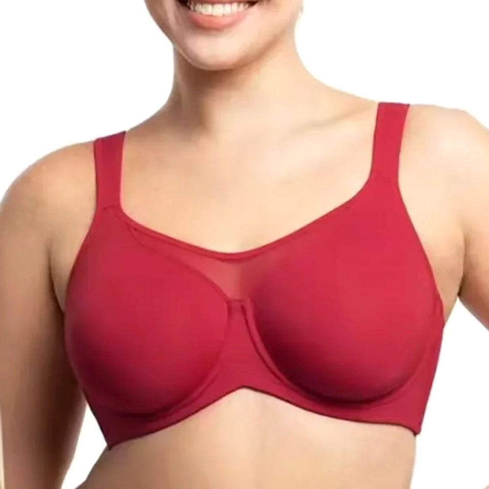 Lovelle Skin Support i vinröd på leende modell: hög mittpanel och breda axelband